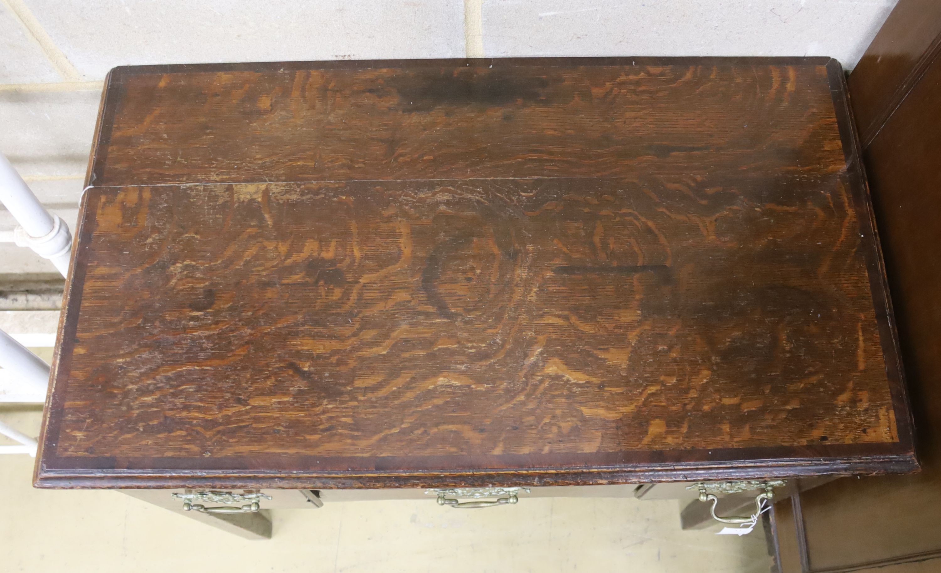 A George III provincial mahogany banded oak low boy, width 82cm, depth 46cm, height 72cm